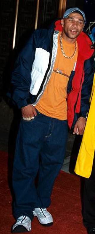 Goldie Wearing Tommy Hilfiger Jacket And Tee 1997